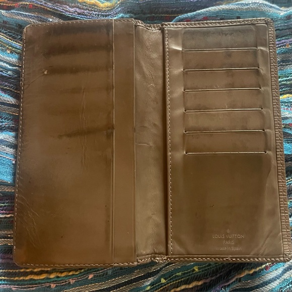 Brown Louis Vuitton epi-leather long wallet. Measures approximately 7 x 4”. GUC - Picture 10 of 14